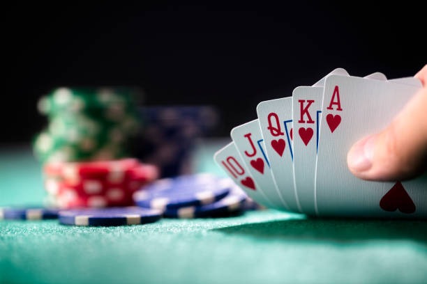 Live casino gaming floor with multiple dealer tables